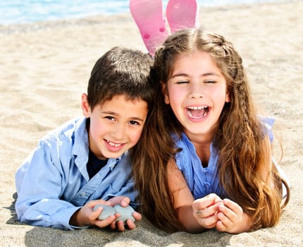 Brother and sister at beach