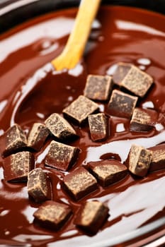 Melting chocolate and spoon