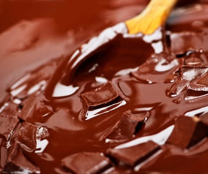 Melting chocolate and spoon