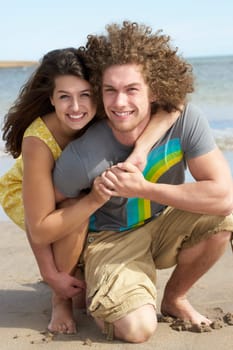 Affectionate Young Couple Having Fun On Beach