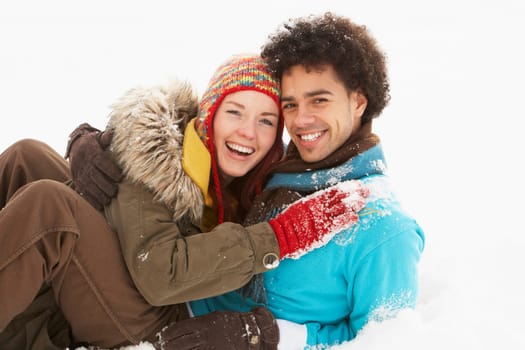 Romantic Teenage Couple Having Fun In Snow