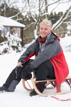 Teenage Boy With Sledge