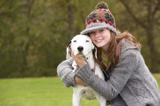 Young Girl Talking Dog For Walk