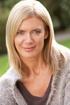 Close Up Portrait Of Blonde Woman Outdoors