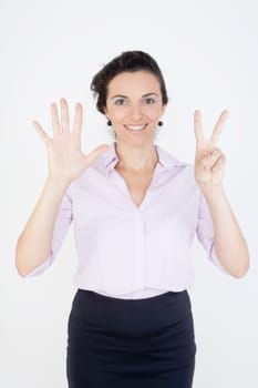 Woman showing the number 7 with fingers