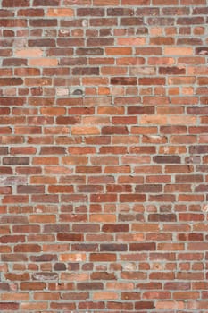 antique brick wall on a 19th century New England mill building