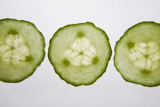 three cucumber rounds
