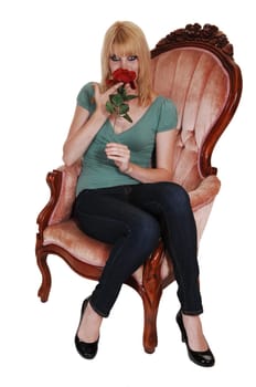 Young girl in armchair.