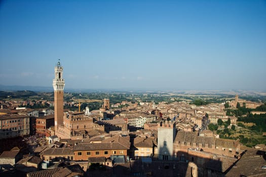 High angle view of Piazza del Campo and surrounding buildings in Siena, Italy. Horizontal shot.