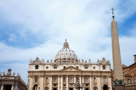 The east facade of St Peter's Basilica with the obelisk in the foreground. Horizontal shot.