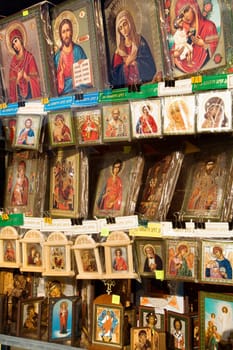 Gifts and cards displaying religious Russian artwork. Vertical shot.