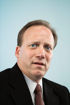 Head and shoulder portrait of middle aged  Caucasian businessman.