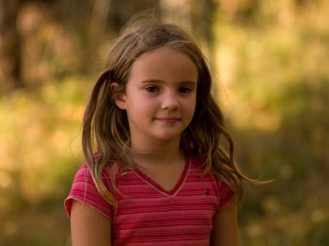 Portrait of young girl outdoors, Lake of the Woods, Ontario, Canada