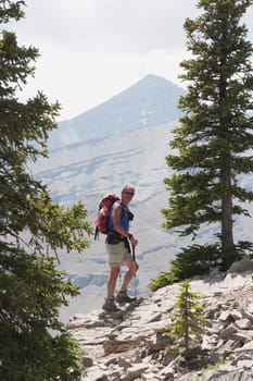 Man hiking on a mountain path