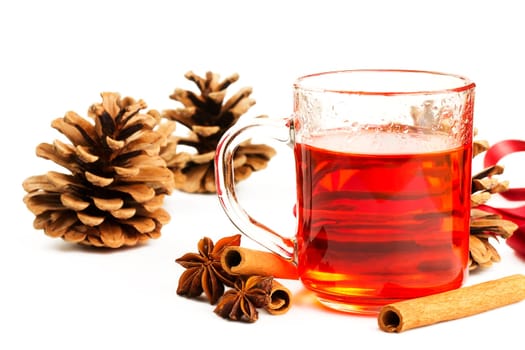 Red tea,cinnamon sticks,star anise and pine cones