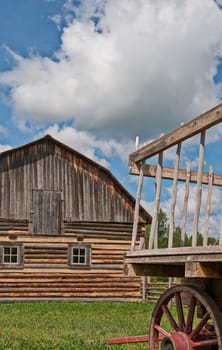 Old fashioned wagon and barn