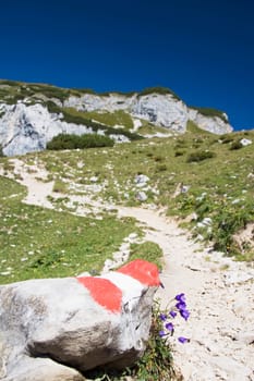 maurach, austria  trail markings on a mountain trail