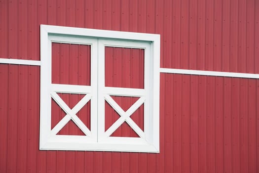 alberta, canada  red barn and white trim