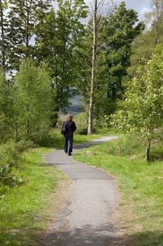 Woman walking on a path