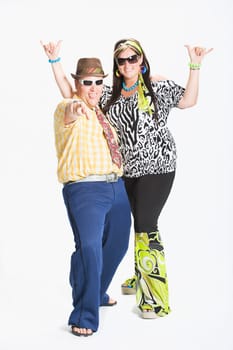 Couple dressed in 1970's clothing