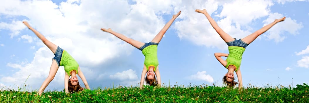Young girl doing cartwheel