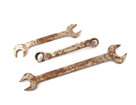 Rusty spanner on a plain white background.