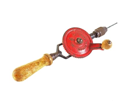 Old hand drill on a plain white background.