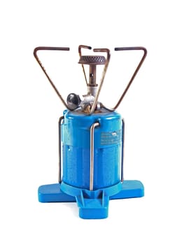 Camping gas cooker on a white background.