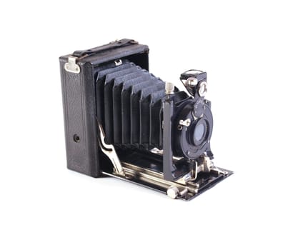 Old plate camera on a white background.