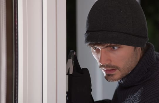 thief with crowbar