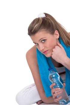Fitness - Young sportive woman with water and towel