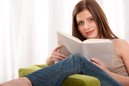 Students series - Young brunette reading book