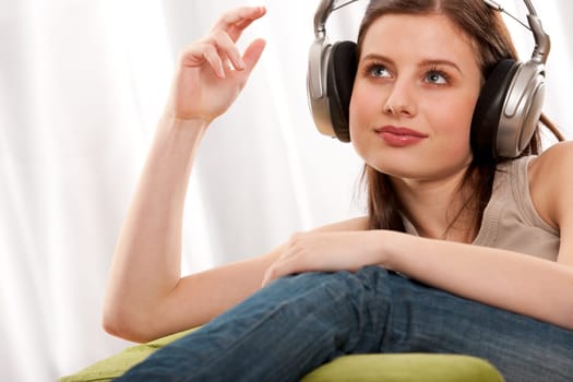 Student - Young brunette listen to music