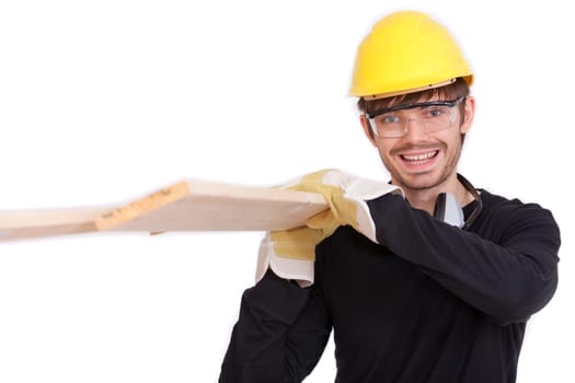 construction worker carrying wood
