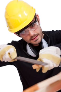 worker grinding wood