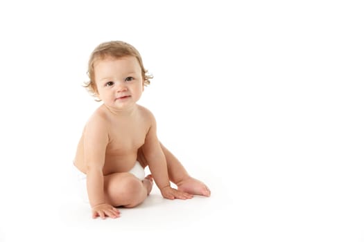 Studio Portrait Of Baby Boy Sitting