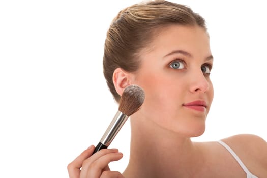 Body care - young woman apply powder