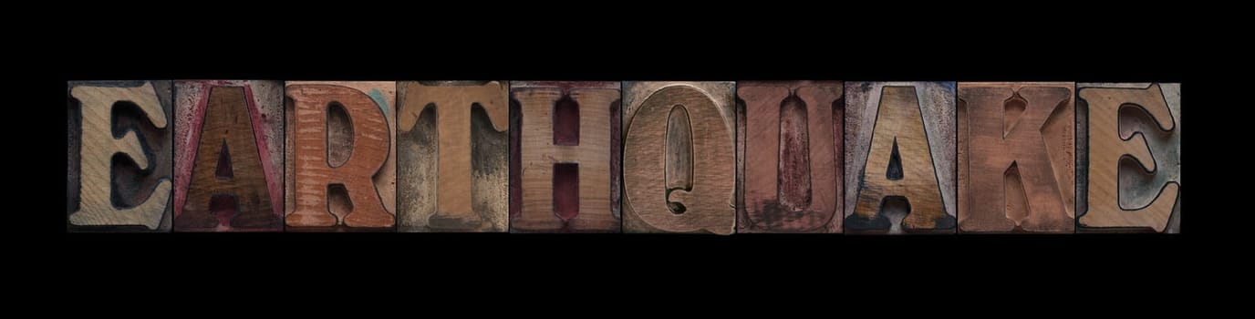earthquake in old letterpress wood type