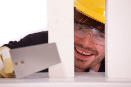 happy bricklayer with spade