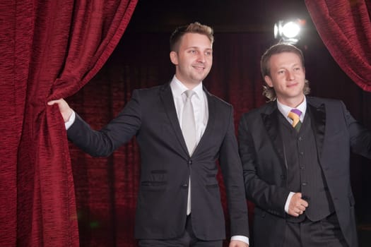two actors in spotlight