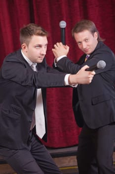 two comedians acting