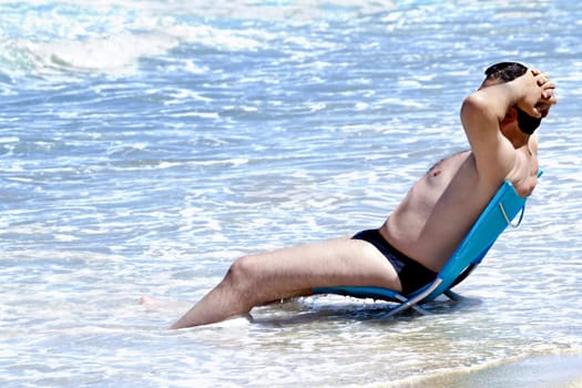 Man on the beach 220810-1