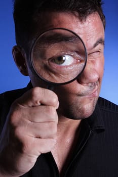 Man with magnifying glass