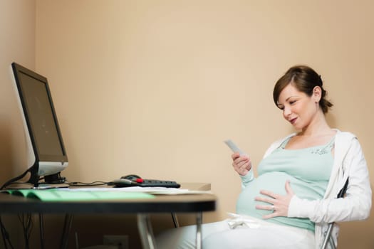 pregnant woman looking at scans