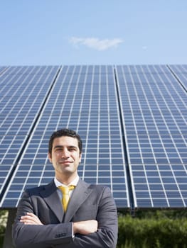 businessman and solar panels