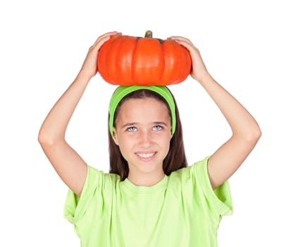 Happy girl in Halloween with a big pumpk