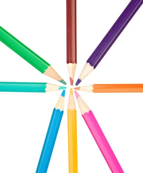 Colored pencils arranged in a star shape