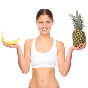 Studio shot of a young woman with fruit