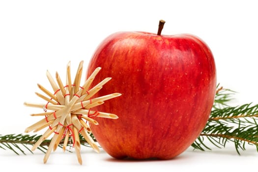 Apple,straw star and fir branch