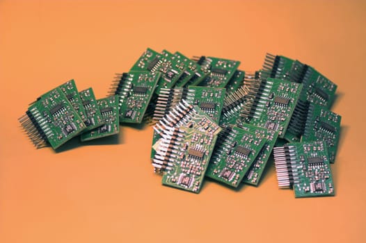 A heap of microchips lying on a table.
